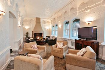 A living room filled with furniture and a television